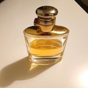 WOMAN Ralph Lauren; EDP; 50ml bottle but half full